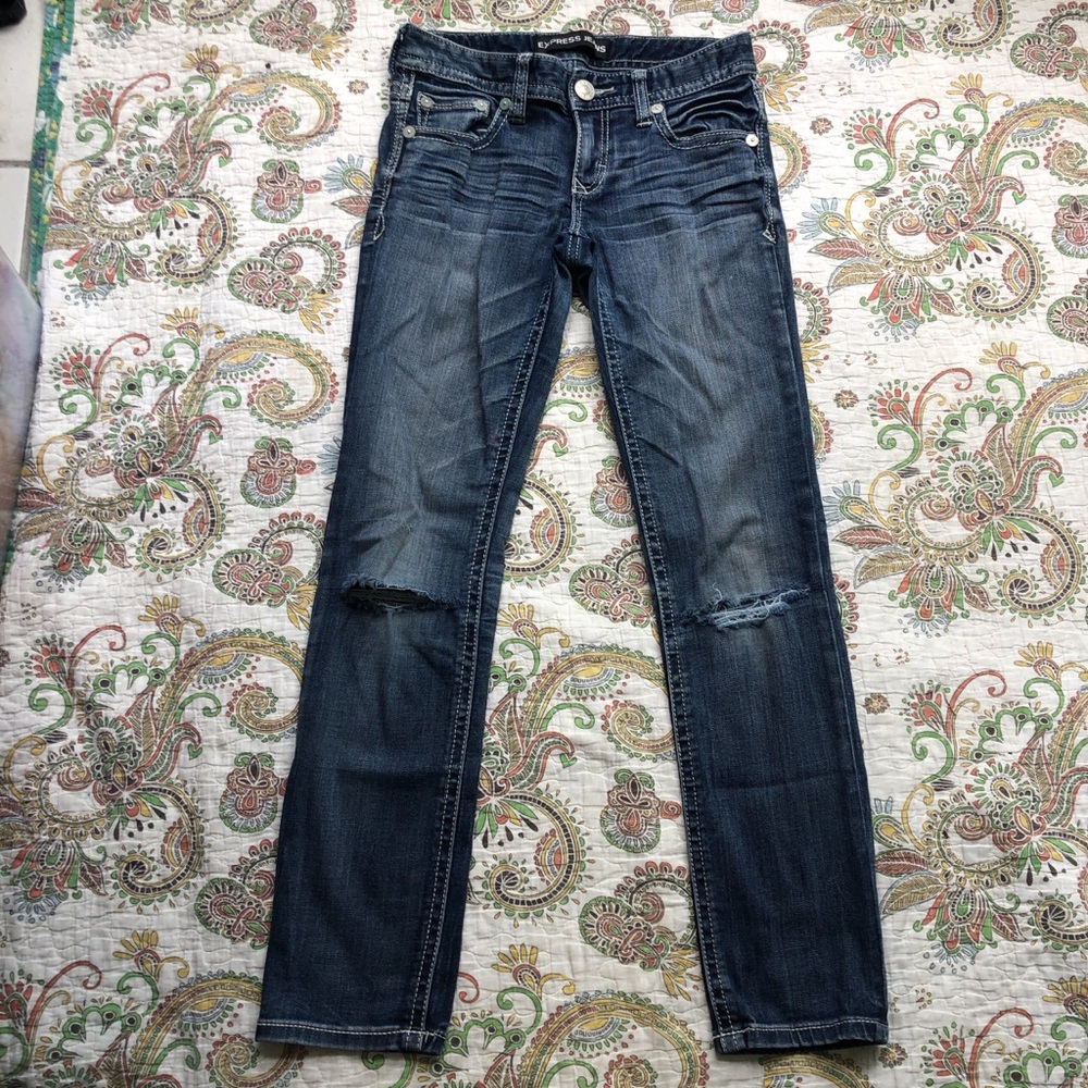 Y2K “Express” Low rise Dark wash skinny jeans with a distressed look